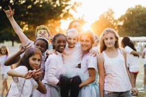 Stock photo of a diverse group of adolescents posing for a picture