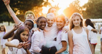 Stock photo of a diverse group of adolescents posing for a picture