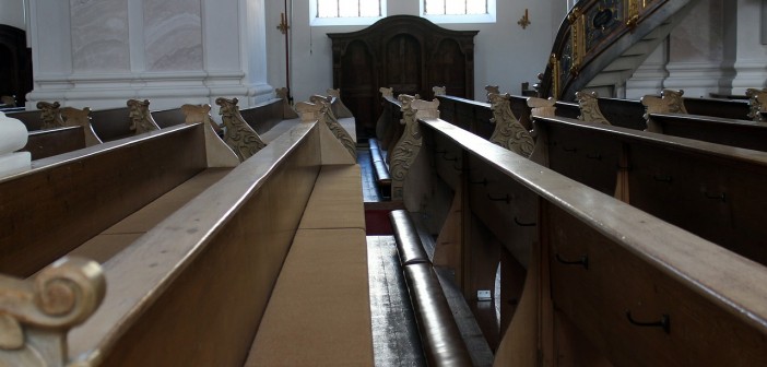 Stock photo of an empty pew