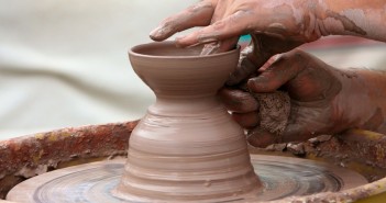 Stock photo of someone crafting something on a potter's wheel