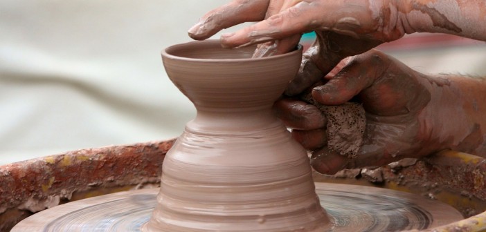 Stock photo of someone crafting something on a potter's wheel