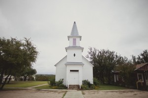 Stock photo of the exterior of a small, white country church