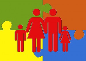 Clip art of a family with a mom, dad, son, and daughter