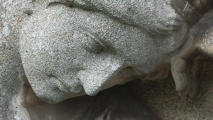 Closeup stock photo of a fairly eroded statue