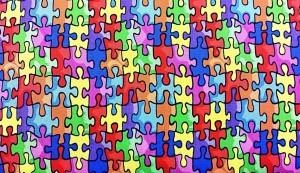 Clip art of a multi-colored puzzle that is put together