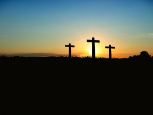 Stock photo of three crosses on a hill