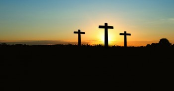 Stock photo of three crosses on a hill