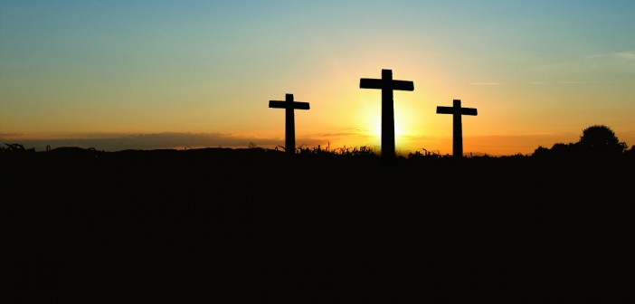 Stock photo of three crosses on a hill