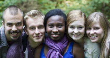 Stock photo of a diverse group of young people posing for a portrait