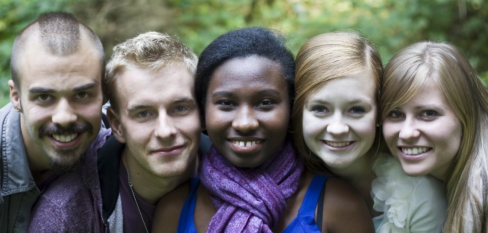 Stock photo of a diverse group of young people posing for a portrait