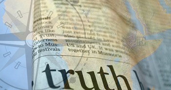 Collage of an atlas with a dictionary entry for "truth" overlain on top of it