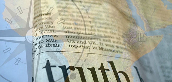 Collage of an atlas with a dictionary entry for "truth" overlain on top of it