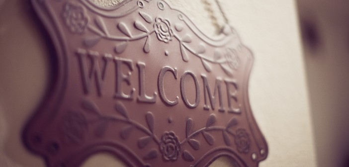 Stock photo of a wrought iron welcome sign