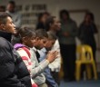 A stock photo of a diverse group of people praying