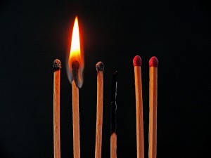 Stock photo of six matches with various levels of lit