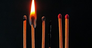 Stock photo of six matches with various levels of lit