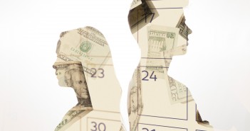 Clip art of a male and female silhouette profile with images of money in the silhouette