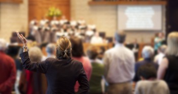 Stock photo of a group of people worshipping together