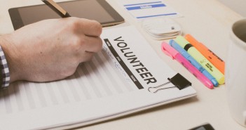 Stock photo of someone signing up to volunteer