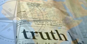 Collage of an atlas with a dictionary entry for "TRUTH" overlaid on it