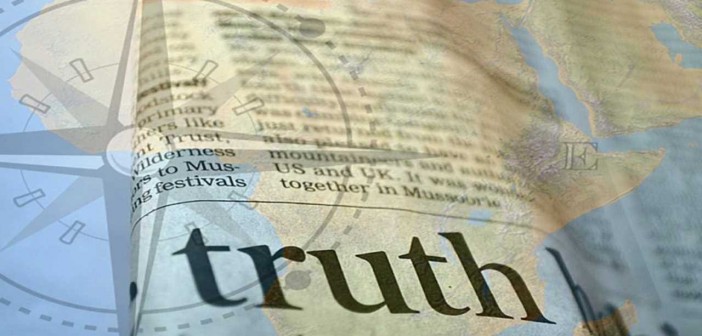 Collage of an atlas with a dictionary entry for "TRUTH" overlaid on it