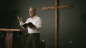 Stock art of an older white man preaching