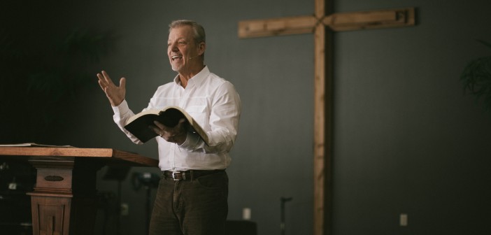 Stock art of an older white man preaching