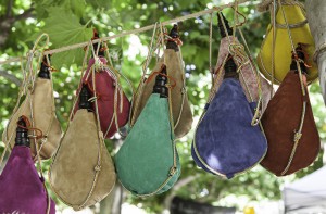Stock photo of a bunch of wineskins hanging from a rope