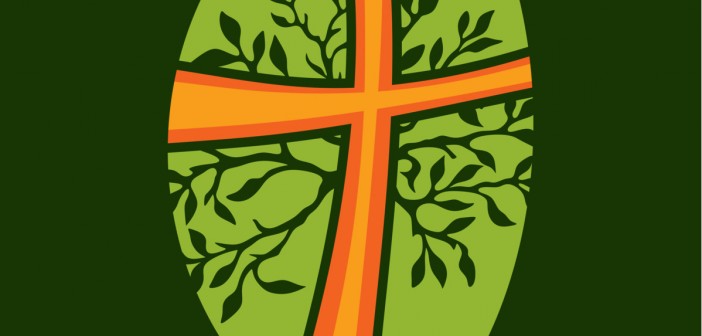 Clip art of an orange cross with green leaves coming out from it
