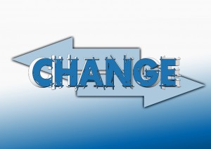 Clip art of the word CHANGE with two arrows pointing in opposite directions behind it