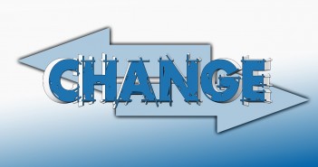 Clip art of the word CHANGE with two arrows pointing in opposite directions behind it