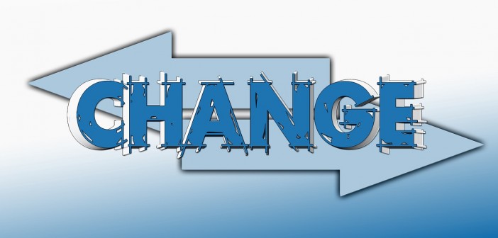 Clip art of the word CHANGE with two arrows pointing in opposite directions behind it