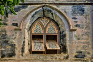 Stock photo of the exterior of a church with its windows open