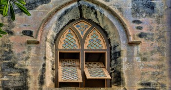 Stock photo of the exterior of a church with its windows open