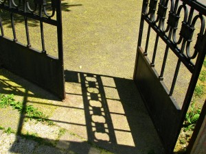 Stock photo of a wrought iron gate that is open