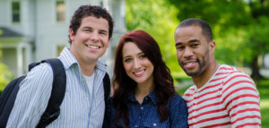 Three smiling youths