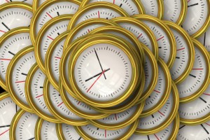 Stock photo of a bunch of white clocks on top of one another. It's 9:00
