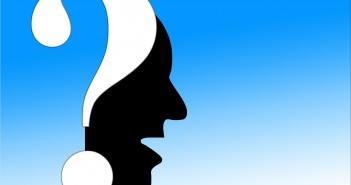 Clip art of a silhouette profile and a question mark