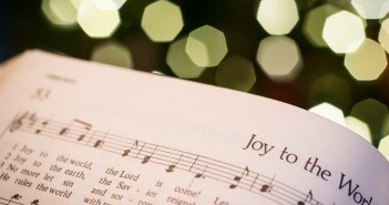 Stock photo of a hymnal open to "Joy to the World"