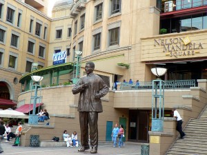 Stock photo of Nelson Mandela Square and a statue of Nelson Mandela