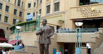 Stock photo of Nelson Mandela Square and a statue of Nelson Mandela