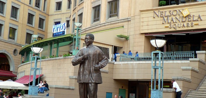 Stock photo of Nelson Mandela Square and a statue of Nelson Mandela