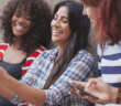 Diverse group of young adults taking a selfie