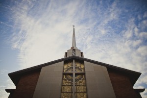 Photo of a church building against the sky.