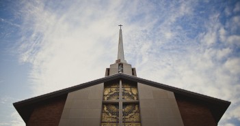 Photo of a church building against the sky.