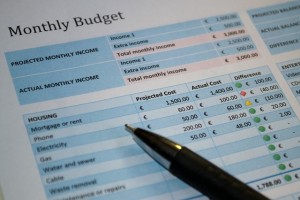 Photo of a spreadsheet and pen