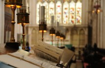 Stock photo of a chancel that has a desk for choristers on it