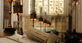 Stock photo of a chancel that has a desk for choristers on it