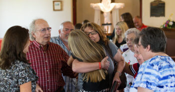 Pastor Laura Vincent hugs Hailey Embrey, 8, following worship at Shiloh United Methodist Church near Clinton, Ky. Photo by Mike DuBose, UMNS
