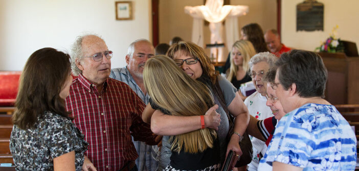 Pastor Laura Vincent hugs Hailey Embrey, 8, following worship at Shiloh United Methodist Church near Clinton, Ky. Photo by Mike DuBose, UMNS